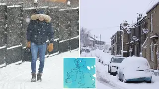 A person walks in the snow while cars are covered in snow