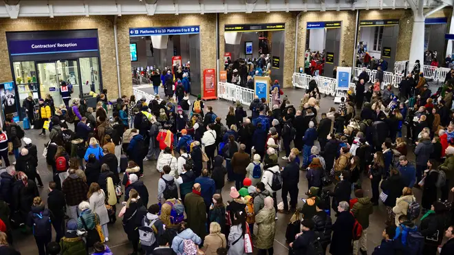 Storm Isha caused commuters to be stranded at King's Cross Station in London as trains were cancelled due to weather conditions