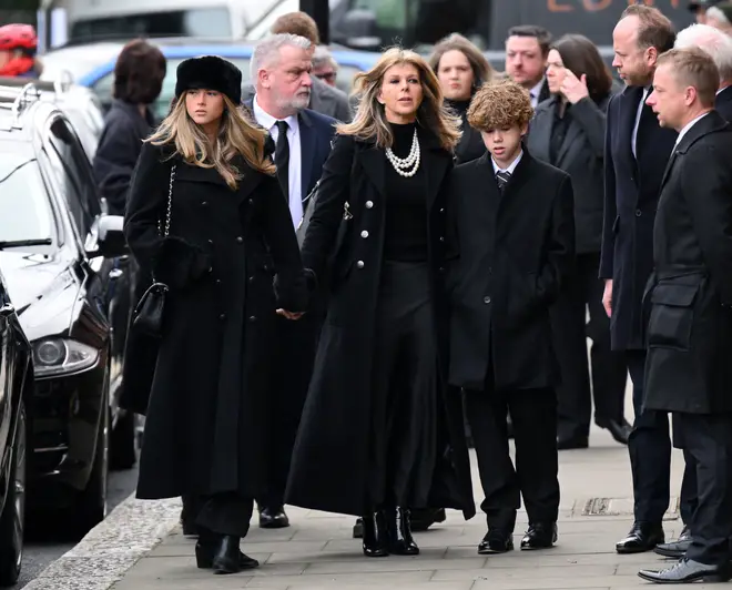 Kate Garraway and her children Darcey and Billy put on a united front as they arrived at the church in Primrose Hill on Friday for the funeral of Derek Draper