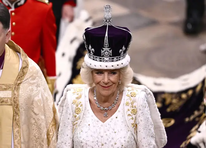 Queen Camilla leaving Westminster Abbey in central London following the coronation ceremony.
