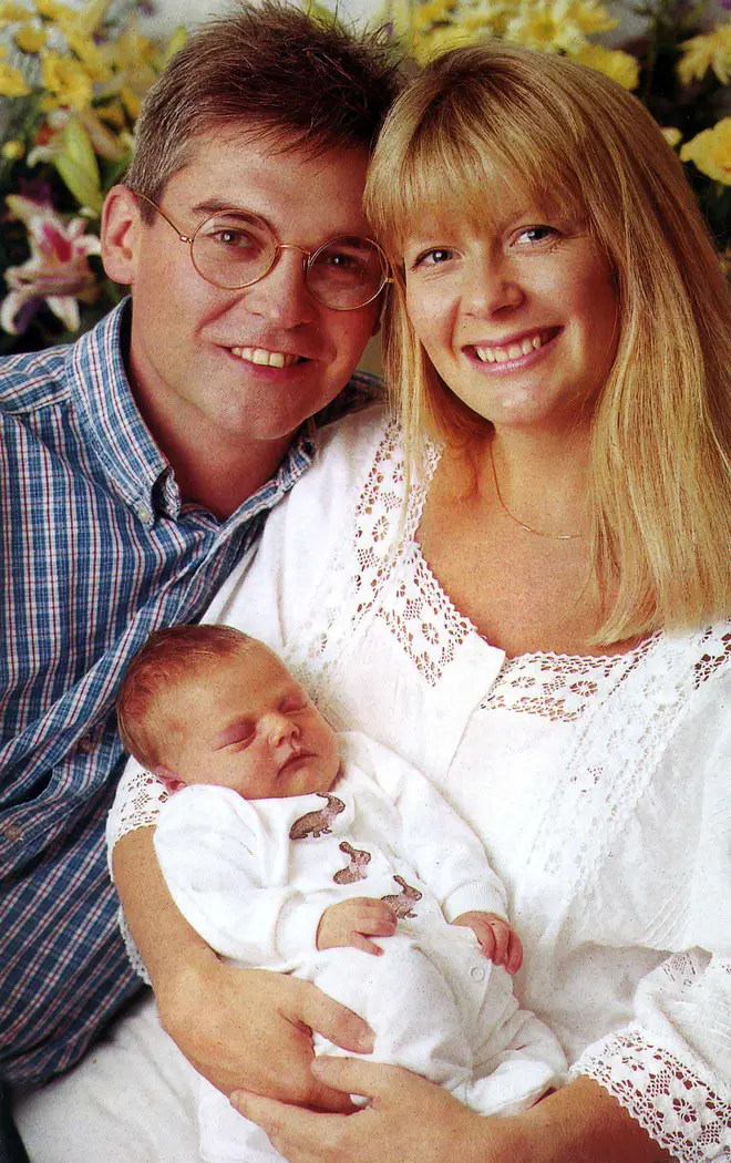 Phillip Schofield and his wife Stephanie Lowe smile with their baby daughter Molly in 1993