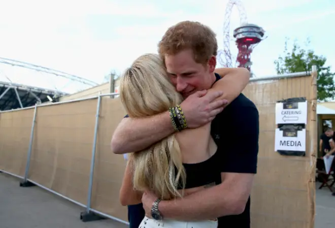 Prince Harry and Ellie Goulding hug