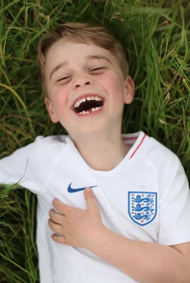 Prince George sported an England football top in the pictures