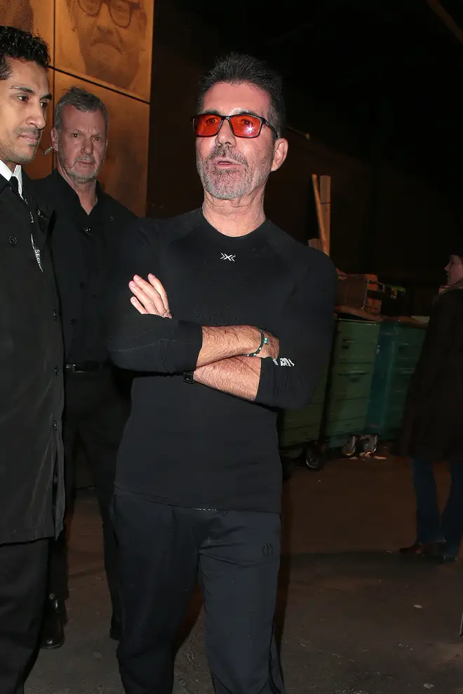 Fans were wondering why Simon Cowell was wearing orange glasses