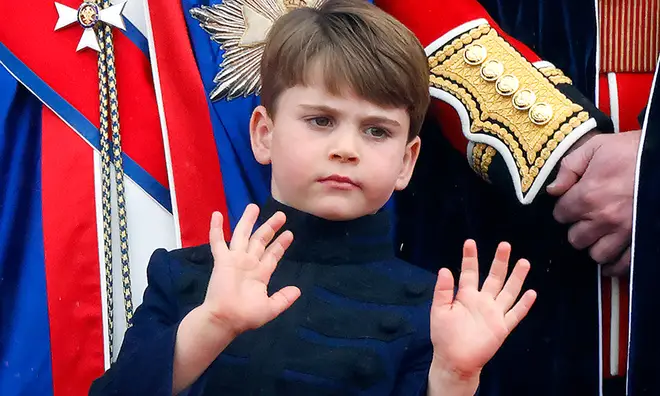 Prince Louis waving on the Buckingham Palace balcony