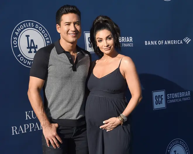 Mario Lopez with his wife Courtney