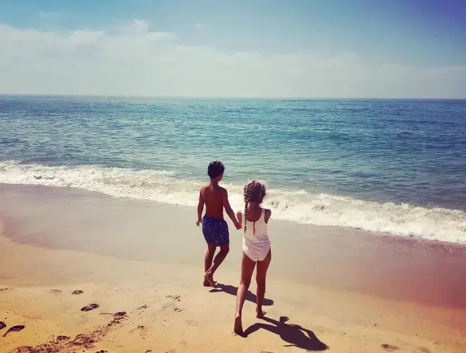 Belle and Harry, Holly's eldest children, played on the beach in the snap