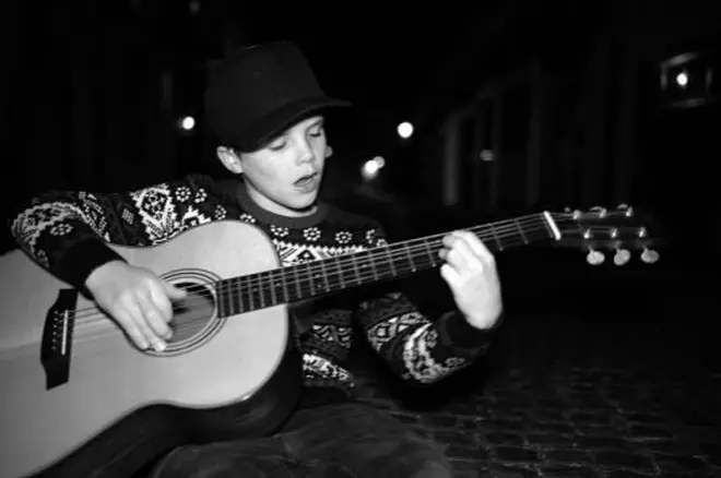 14-year-old Cruz loves music and is often pictured singing or playing guitar