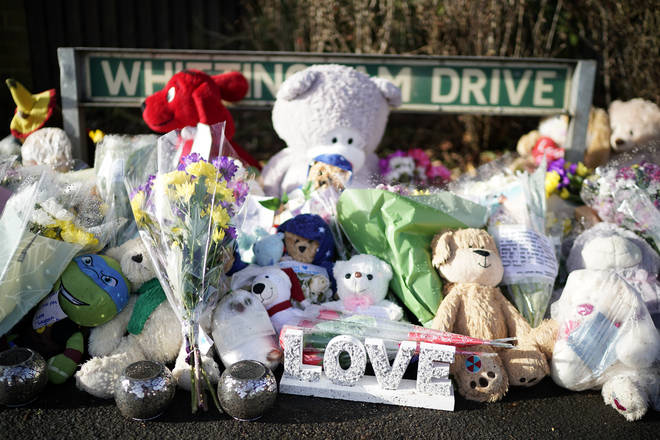 Tributes Are Laid At Burnt Out Home Where Four Children Died