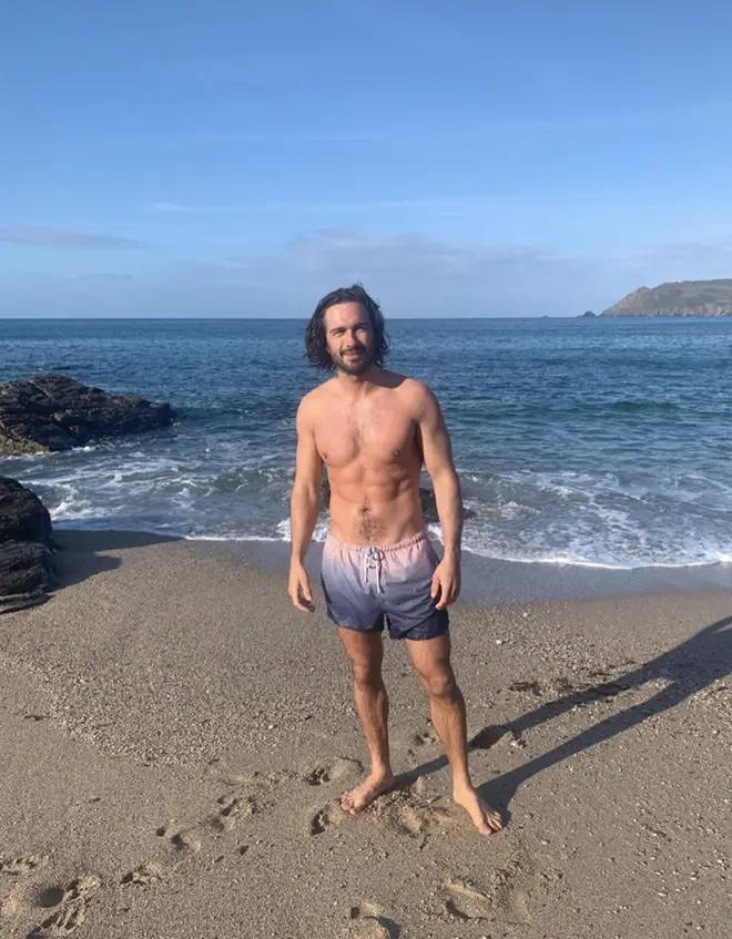 Joe posed on the beach in Devon and looked incredible