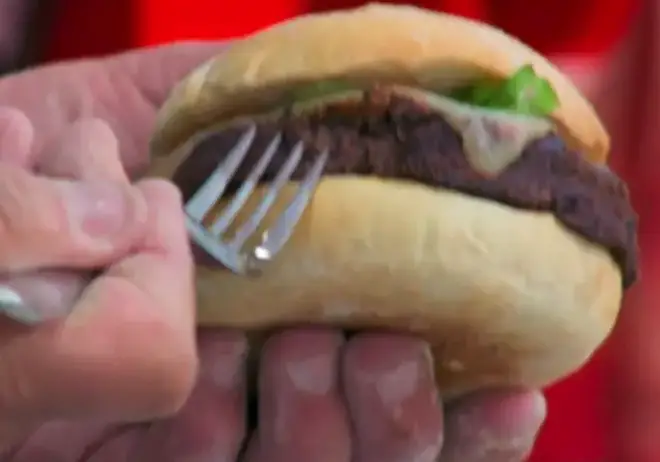 Paul Hollywood ate a burger with a fork