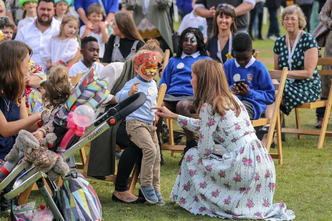 The Duchess of Cambridge attended a festival held in the gardens, where she got a chance to talk to many families