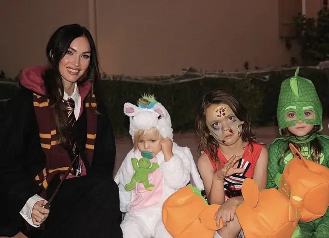 Megan pictured with her three sons at Halloween last year