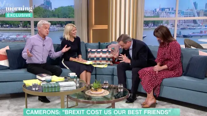 David Cameron bent over as he laughed over the mistake