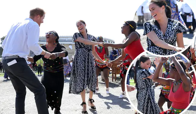The Duke and Duchess of Sussex were good sports as they joined in the dancing