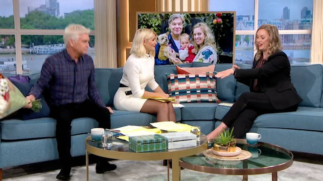 Holly and Philip congratulated Sharon as she showed them the diamond ring