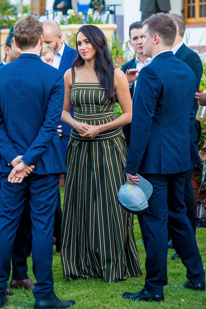 The Duchess of Sussex also re-wore her Martin Grant striped dress
