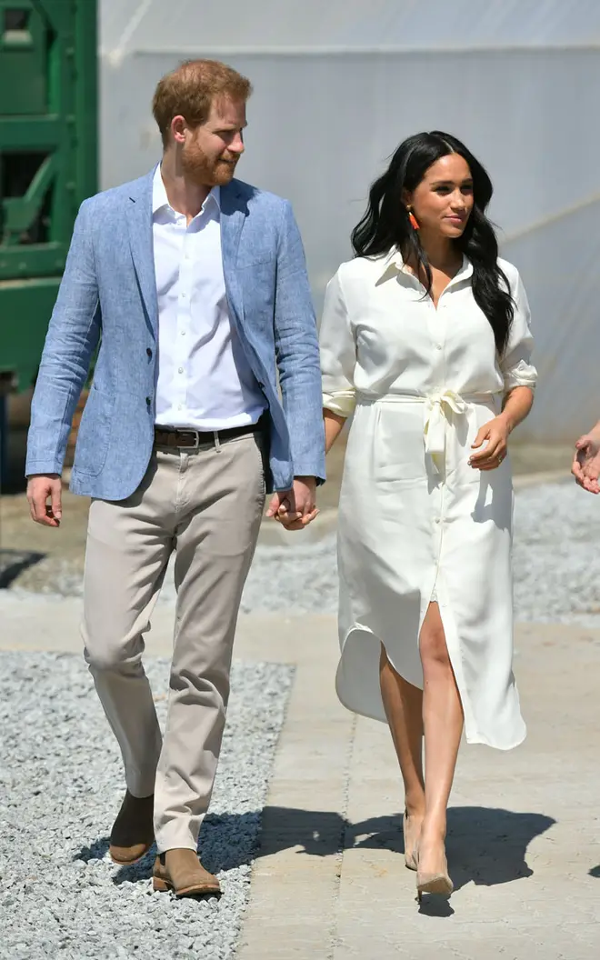 The Duchess of Sussex looked stunning in a white shirt dress for the occassion