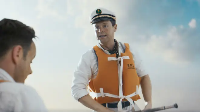 Dec looks like he's the captain of the boat and is rowing the pair