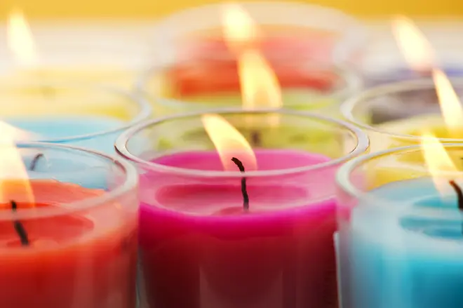 It is unlikely that breathing in scented candles in moderation will cause any health issues (stock image)