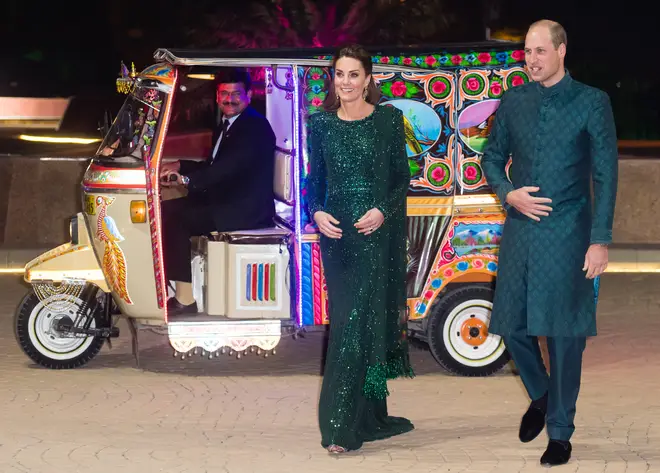 The royal couple arrived in a Tuk Tuk car