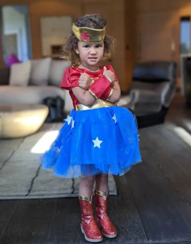 John Legend and Chrisyy Teigen's little one Luna looked ready to save the world in this Superwoman costume