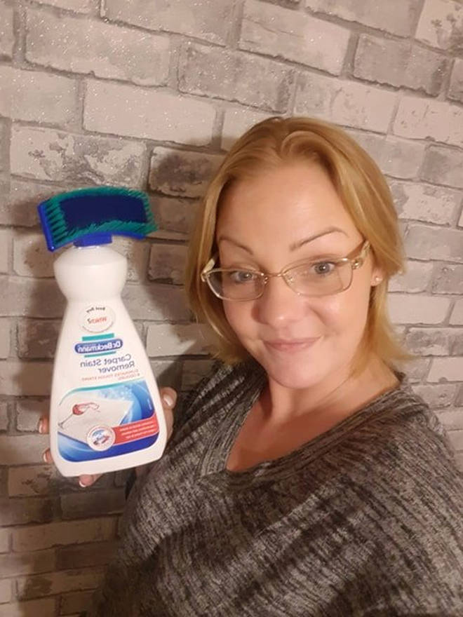 Angela shared the hack on Facebook and posed with the bottle in question
