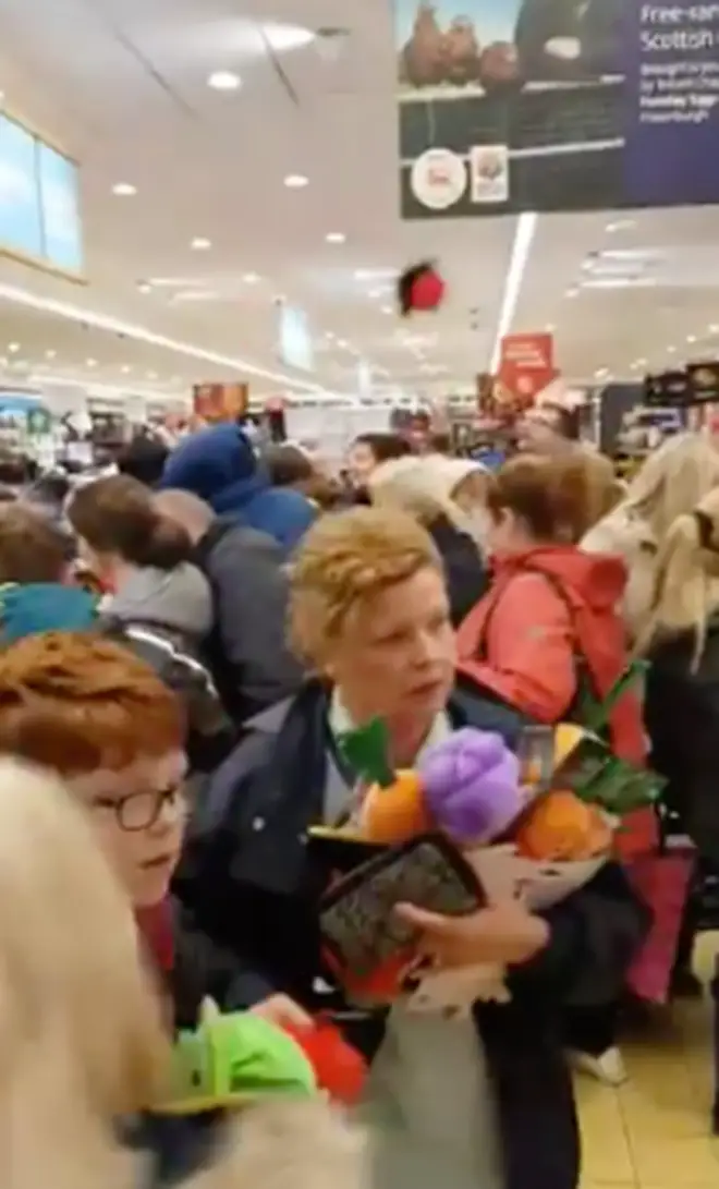 Toys could be seen been thrown from the front of the queue to the back