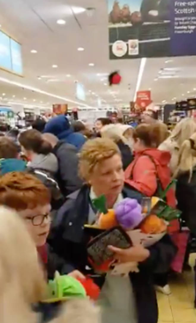 Toys could be seen been thrown from the front of the queue to the back